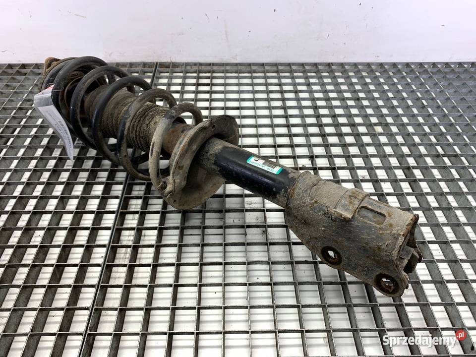 AMORTYZATOR LEWY PRZÓD ZE SPRĘŻYNĄ MAZDA CX7 23 Części samochodowe