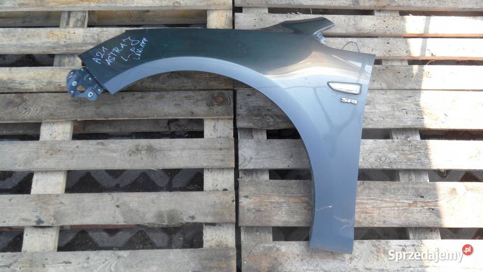 OPEL ASTRA J IV 11r błotnik lewy przód