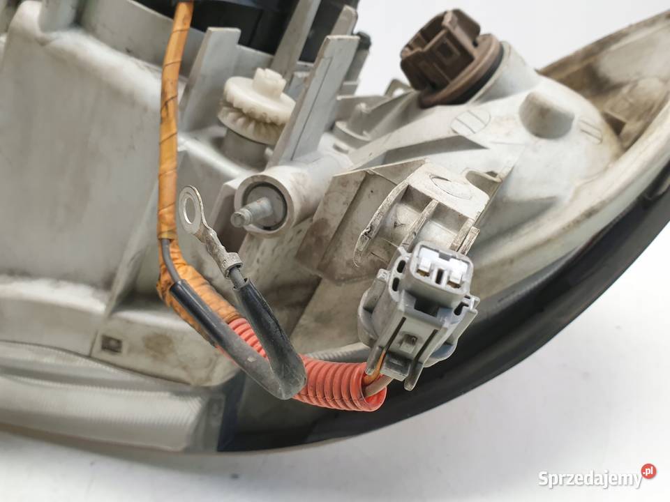 LAMPA PRAWA Nissan Maxima V A33 PRZEDNIA przód Rudka