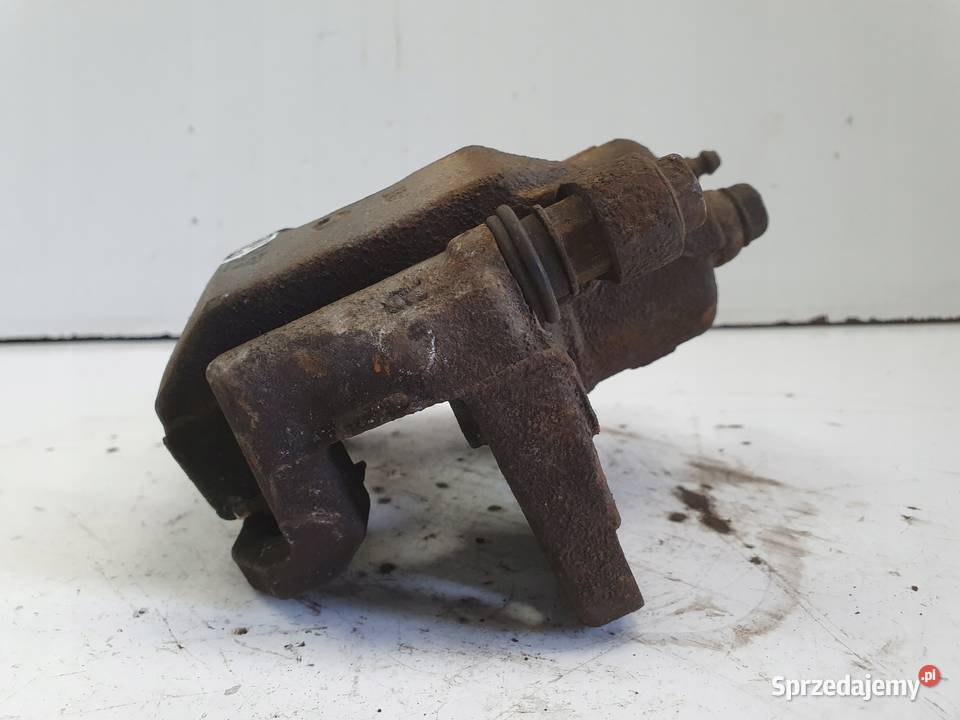 Toyota IQ PRAWY PRZEDNI ZACISK HAMULCOWY przód osobowe Rudka