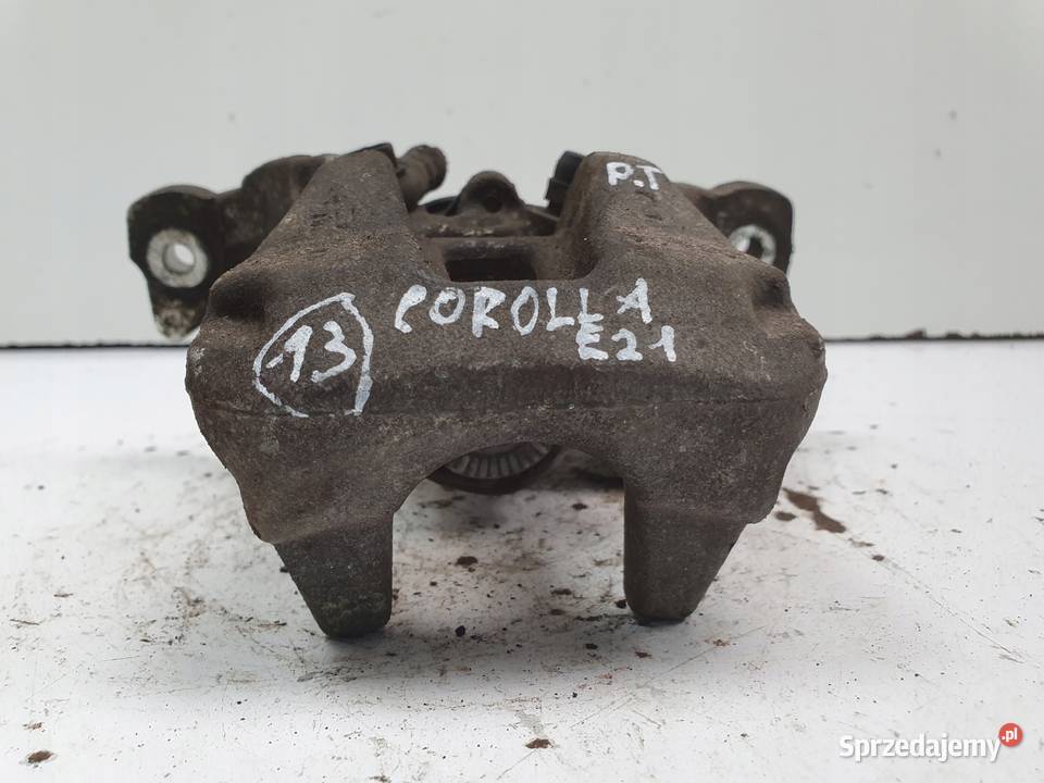 Toyota Corolla XII E21 TYLNY ZACISK HAMULCOWY Janów