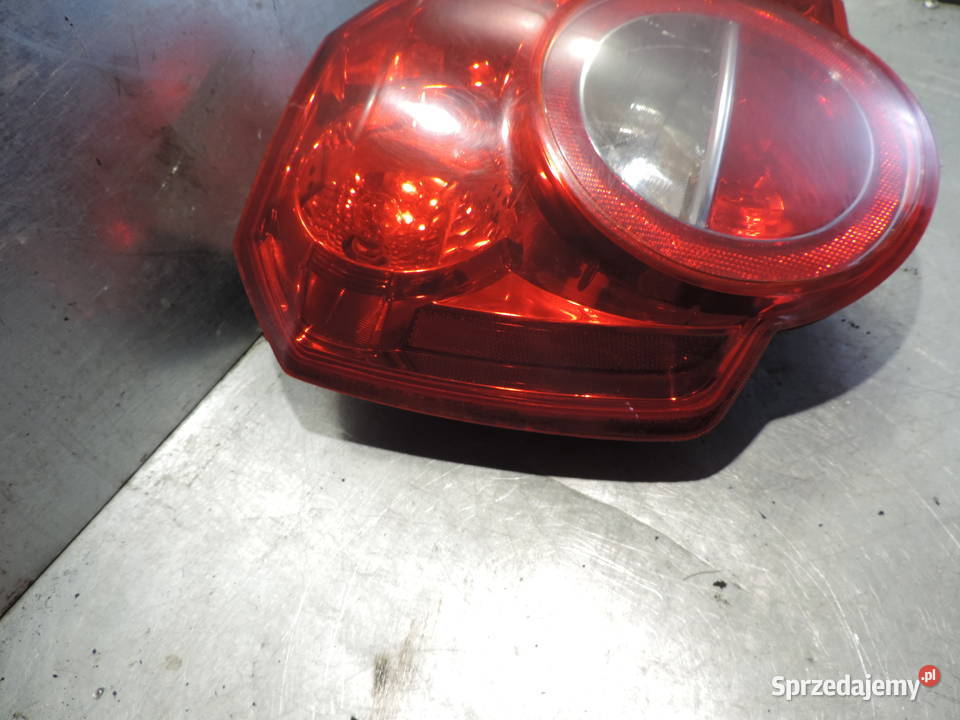 CHEVROLET AVEO T250 HB LIFT LAMPA TYŁ LEWA