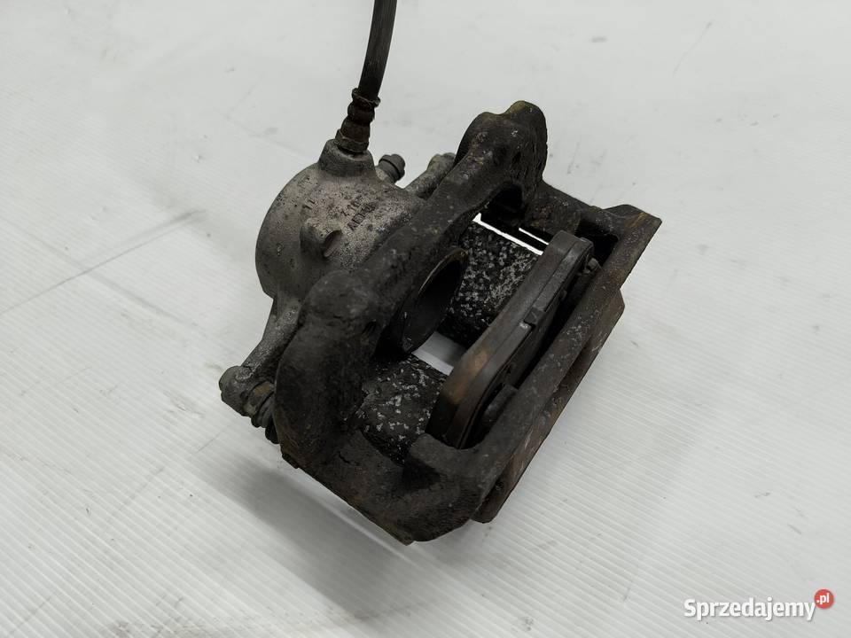 ZACISK LEWY PRZÓD MERCEDES EKLASA W212 22 CDI