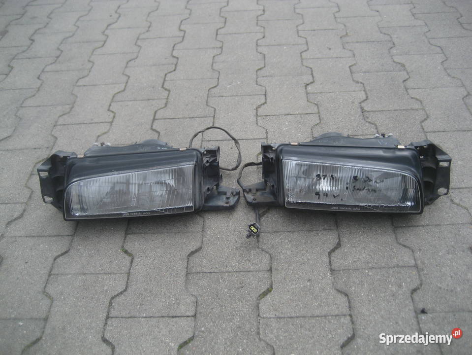 mazda 323 8993r lampy przód prawa lewa Rakoniewice sprzedam