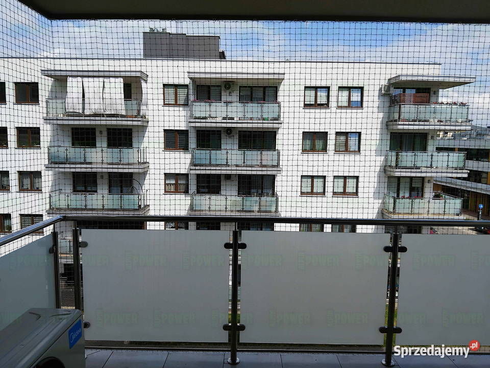 Założenie siatki na balkon przed gołębiami Warszawa