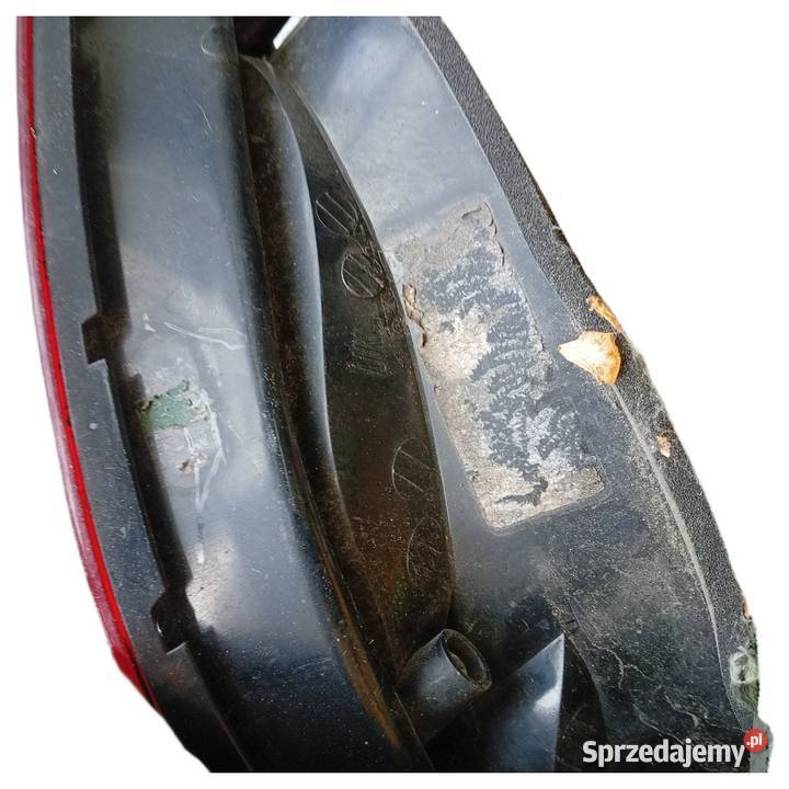 Lampa tylna lewa Opel Astra J Kombi w błotnik wielkopolskie