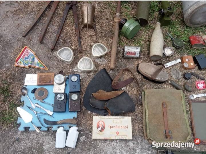 Chlebak plecak latarka nożyce łopatka ryby biwak