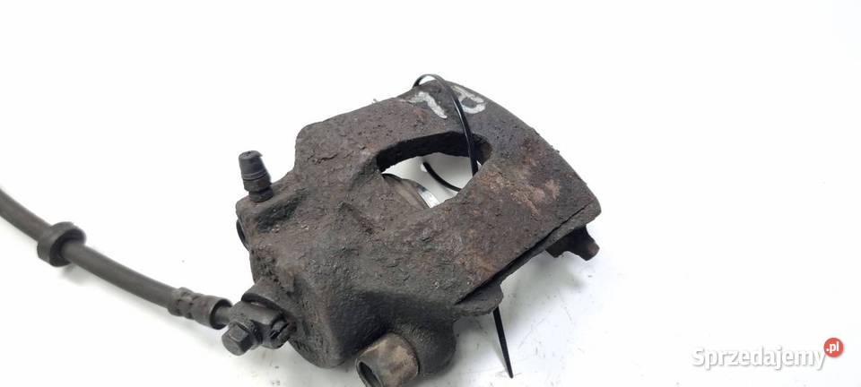 ZACISK HAMULCOWY PRZÓD LEWY SKODA OCTAVIA I Pozostałe Części samochodowe Lipno