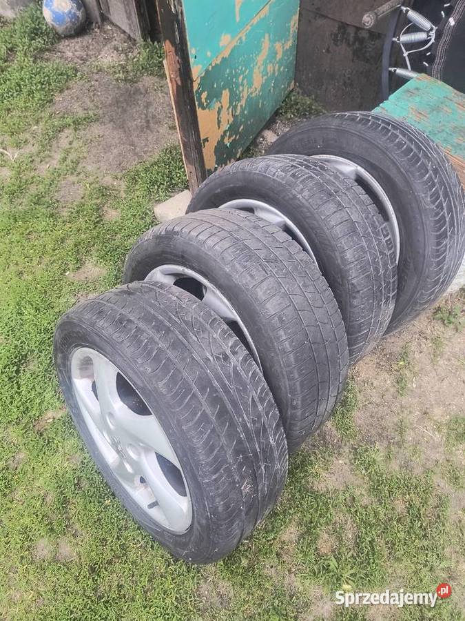 Sprzedam felgi aluminiowe z oponami letnimi 15