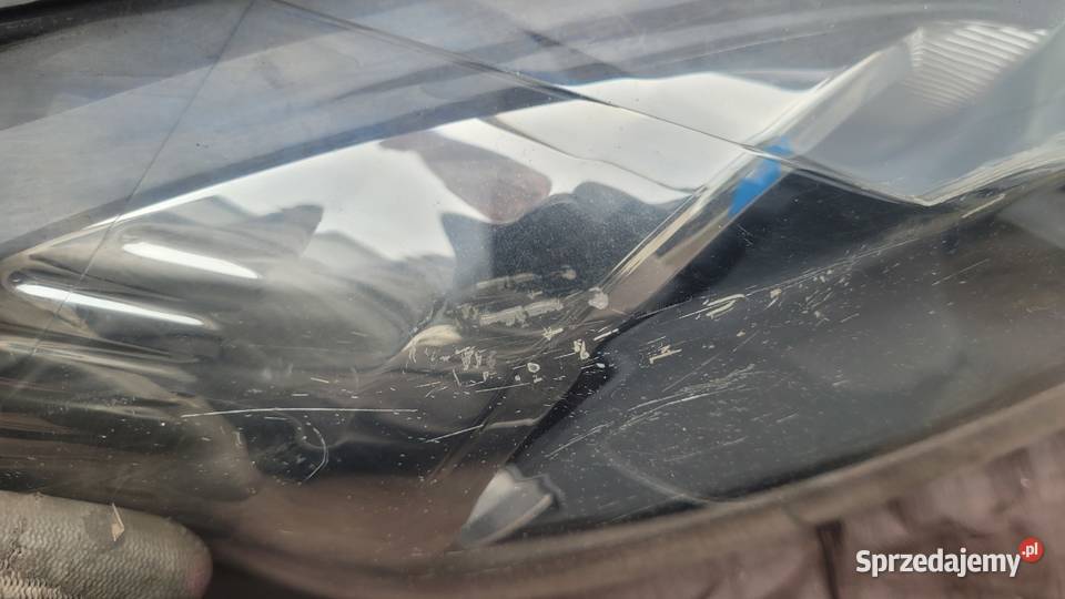 FORD FIESTA MK7 REFLEKTOR LEWY LAMPA LEWA PRZÓD osobowe śląskie Ruda Śląska