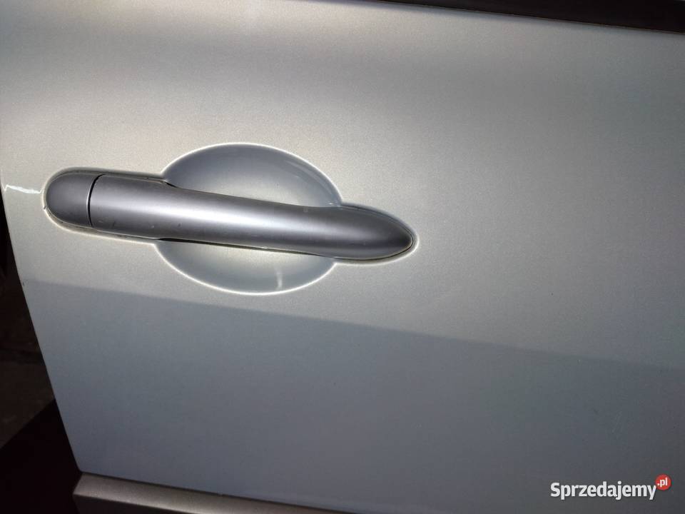 DRZWI RENAULT MEGANE 5d PRAWY PRZÓD SILVER Mietków