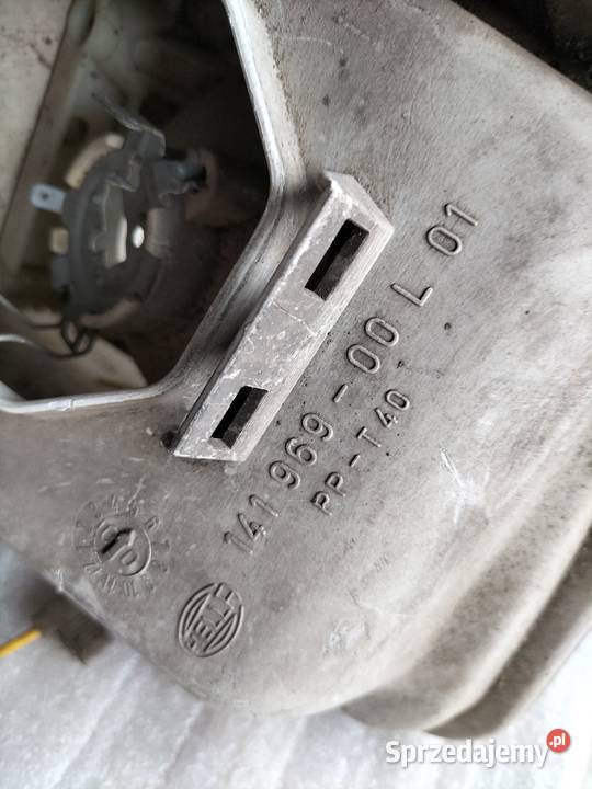 Passat B4 LAMPA PRZÓD PRZEDNIA LEWA osobowe Oświetlenie Kamień-Kolonia