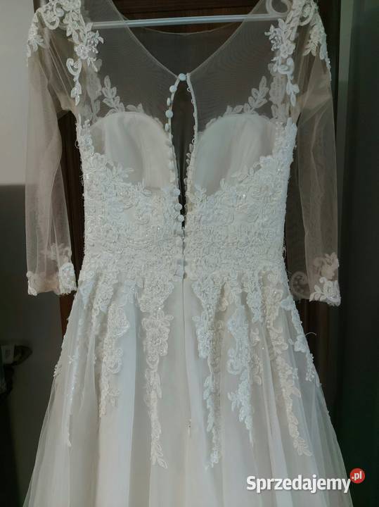 Suknia ślubna o kroju księżniczki 64cm Pionki