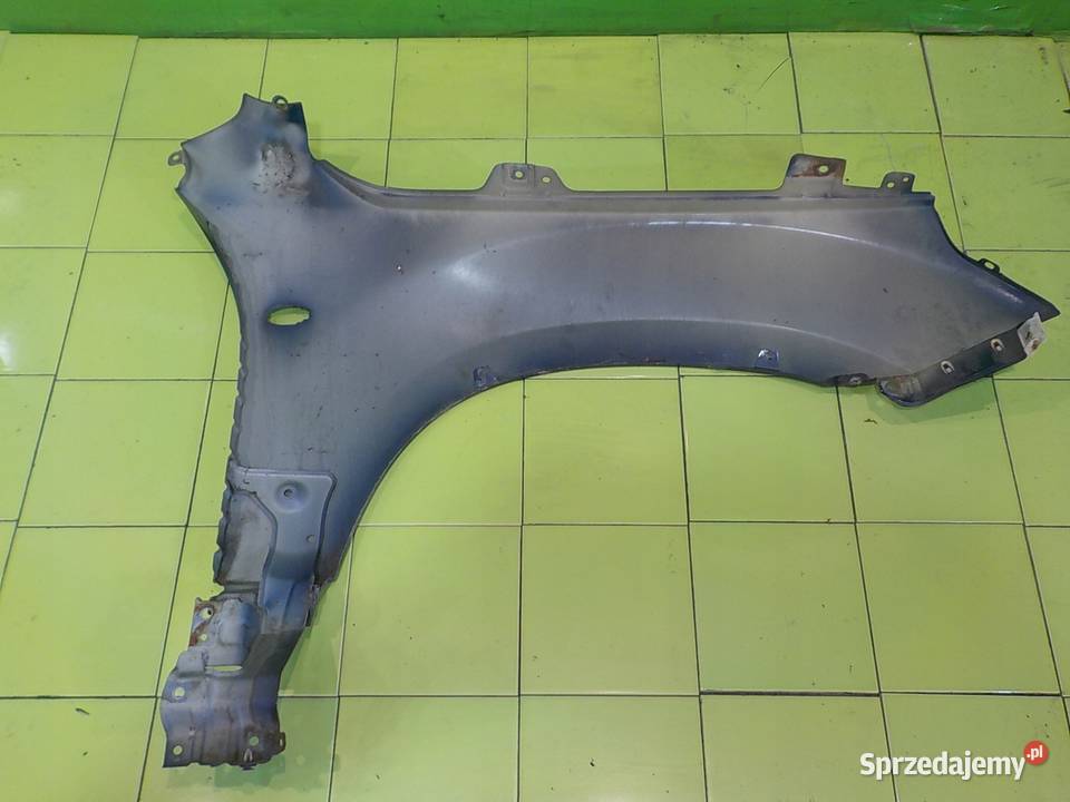 SUZUKI GRAND VITARA II 08r 5D blotnik lewy przod Suków