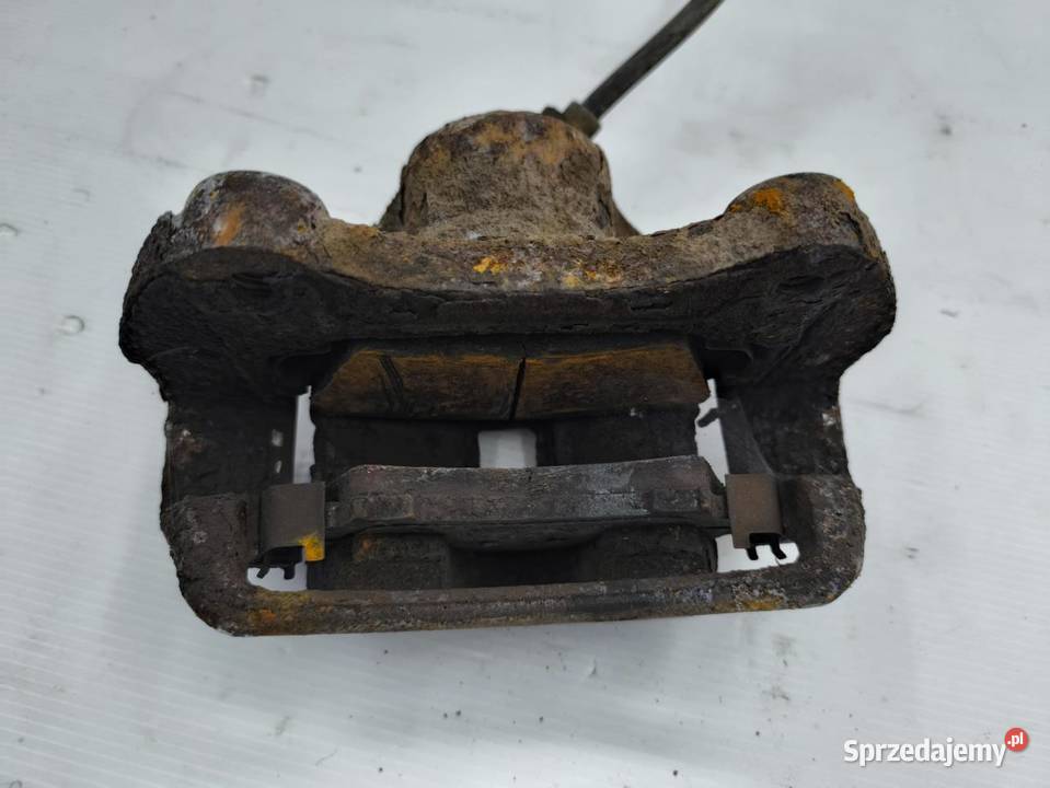 ZACISK PRAWY PRZÓD OPEL ZAFIRA C 20 CDTI