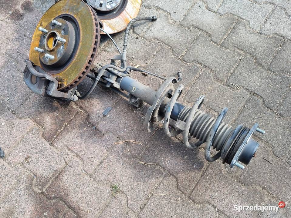 MCPERSON AMORTYZATOR SPRĘŻYNA ZWROTNICA PRAWY osobowe Amortyzatory