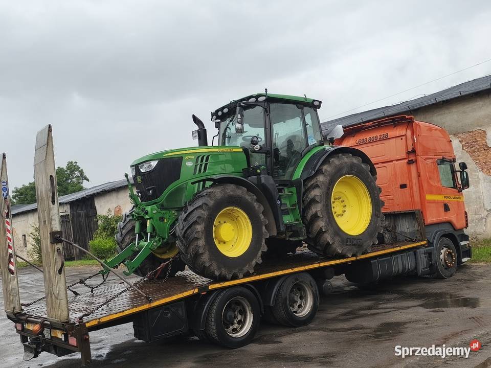 Transport maszyn pomoc drogowa laweta Września