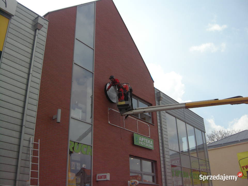 prace wysokościowe alpinista mycie malowanie