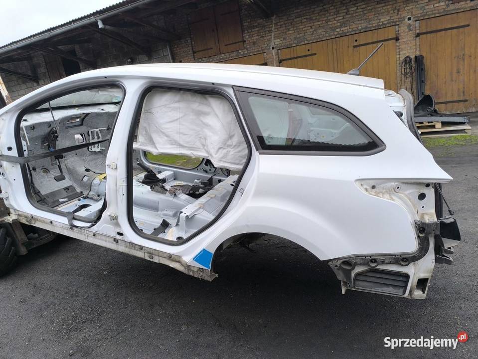 BŁOTNIK LEWY TYŁ FORD FOCUS MK3 LIFT KOMBI