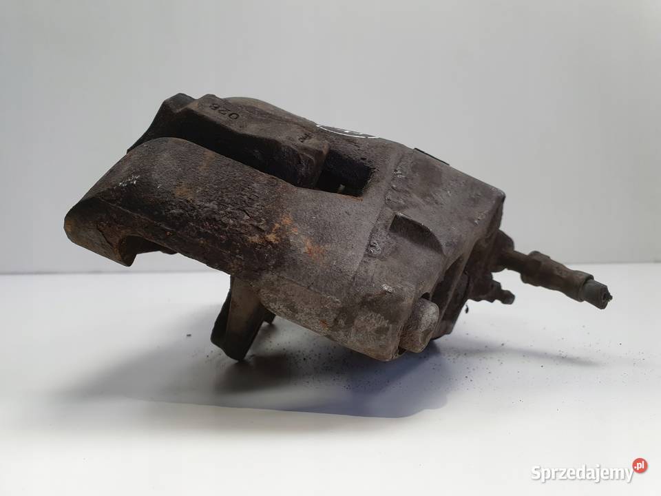 Volvo S40 II V50 PRZEDNI ZACISK HAMULCOWY Lewy osobowe Motoryzacja