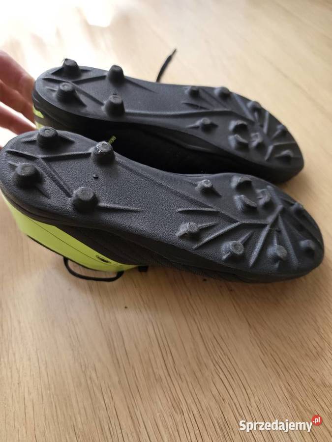 Buty piłkarskie korki Kipsta 100 czarnoneonowe Bełchatów