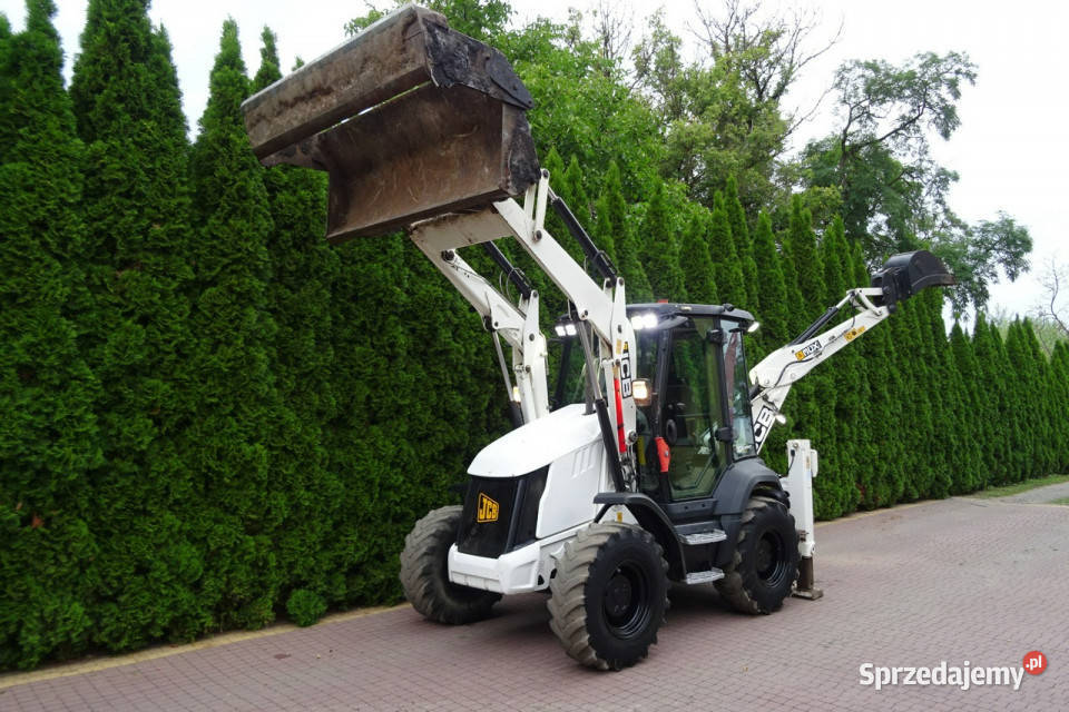 na równych kołach JCB 2CX 3CX Koparkoładowarka Góra Kalwaria