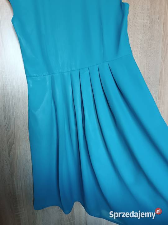 Niebieska sukienka koktajlowa odcięty pas Bez wzoru sprzedam