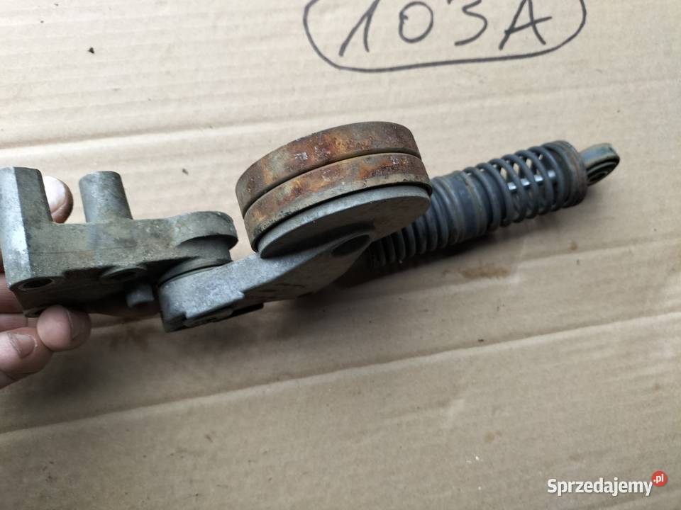 NAPINACZ PASKA KLINOWEGO AUDU 100 A6C4 A6 S6 C4 osobowe Kamień-Kolonia