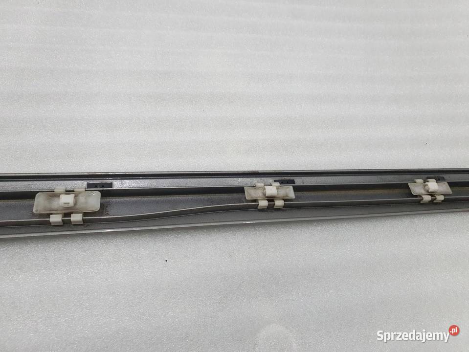 LISTWA DRZWI LEWY PRZÓD MERCEDES W203 2036904962 osobowe Osłony i zaślepki