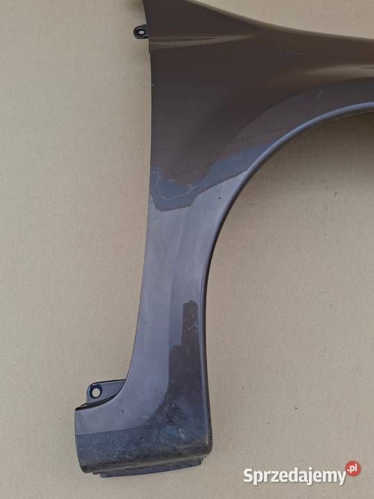 RENAULT MODUS BŁOTNIK PRAWY PRZÓD ORYGINAŁ Bieleń