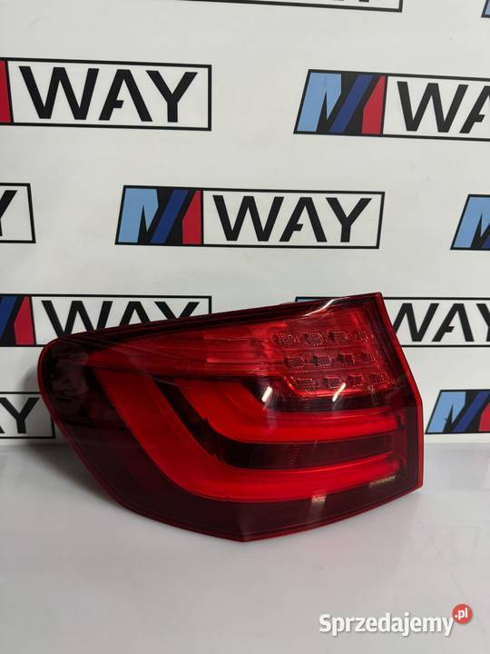 BMW F11 LAMPA TYŁ LEWA W BŁOTNIK ORYGINAŁ osobowe