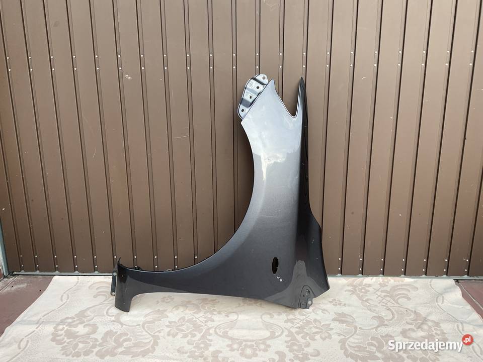 BŁOTNIK PRAWY PRZÓD TOYOTA COROLLA E15 0710 Pleszew sprzedam