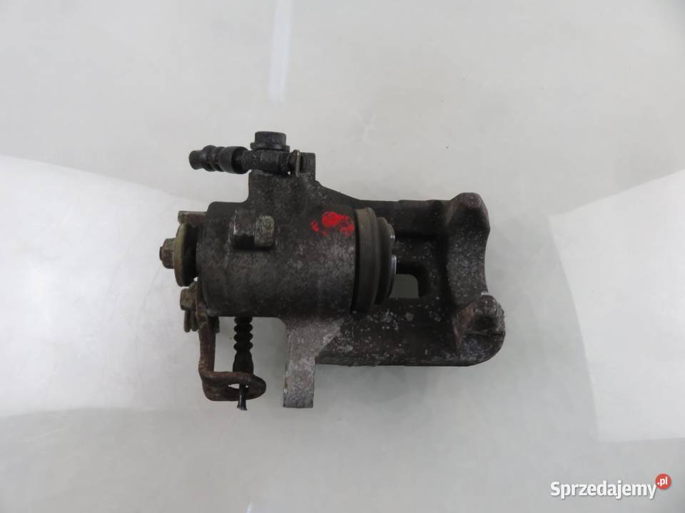 ZACISK LEWY TYŁ AUDI A4 B6 19 TDI sprzedam