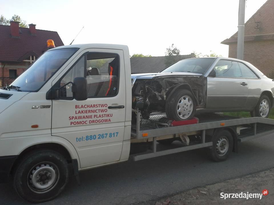 Laweta CHOJNIK Pomoc Drogowa Transport maszyn usługi moto