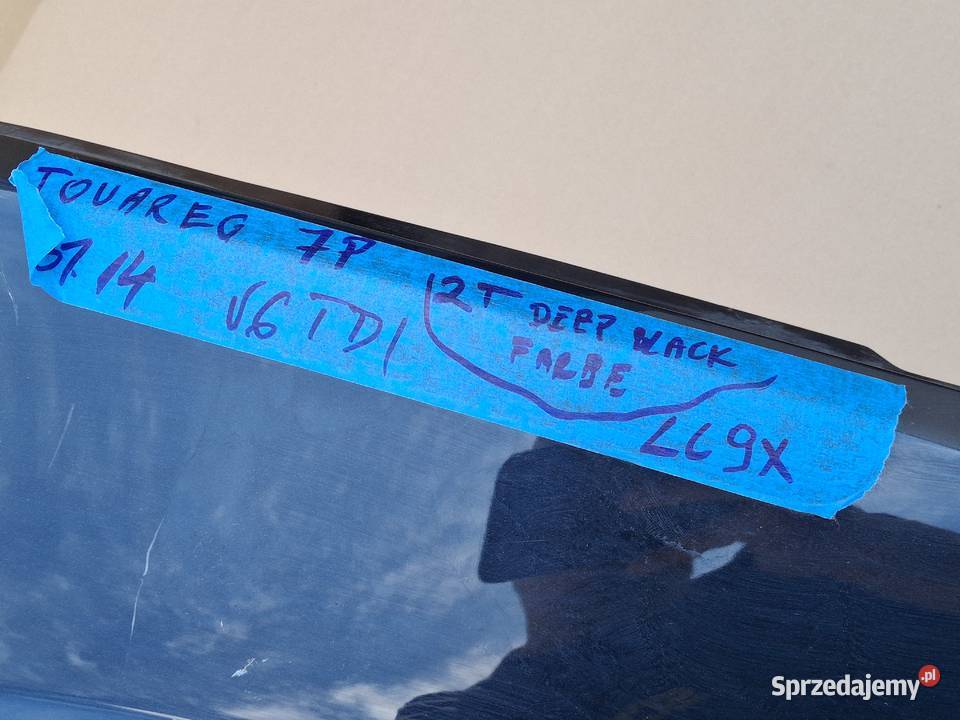 VW TOUAREG II BŁOTNIK LEWY PRZÓD ORYGINAŁ LC9X Bieleń