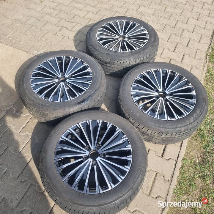Felgi aluminiowe Passat B8 opony zimowe 23545R18 Samochodowe Olesno sprzedam