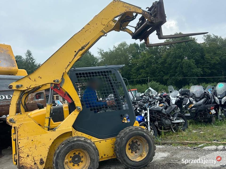 Miniładowarka Ładowarka Kompaktowa KOMATSU SK Rok produkcji 2007 Pozostałe Tymowa