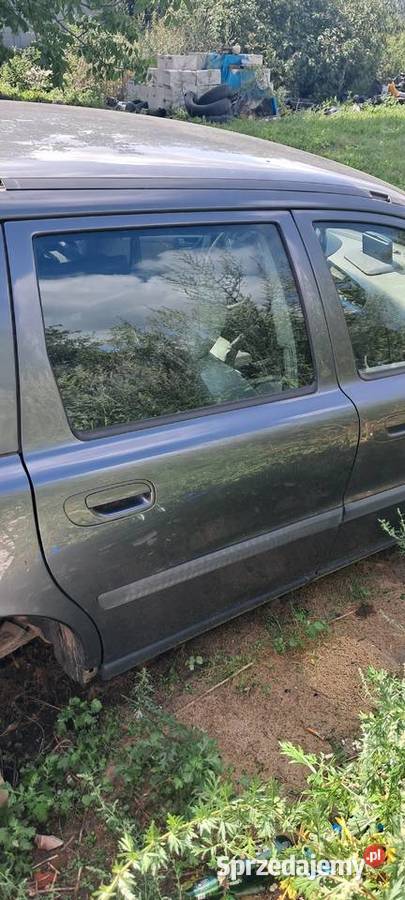 Dzwi Volvo V70 części blacharskie wielkopolskie Gniezno sprzedam