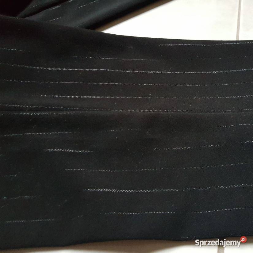 spodnie z kantem dzwony ze srebrną nitką lejace Moda i Styl