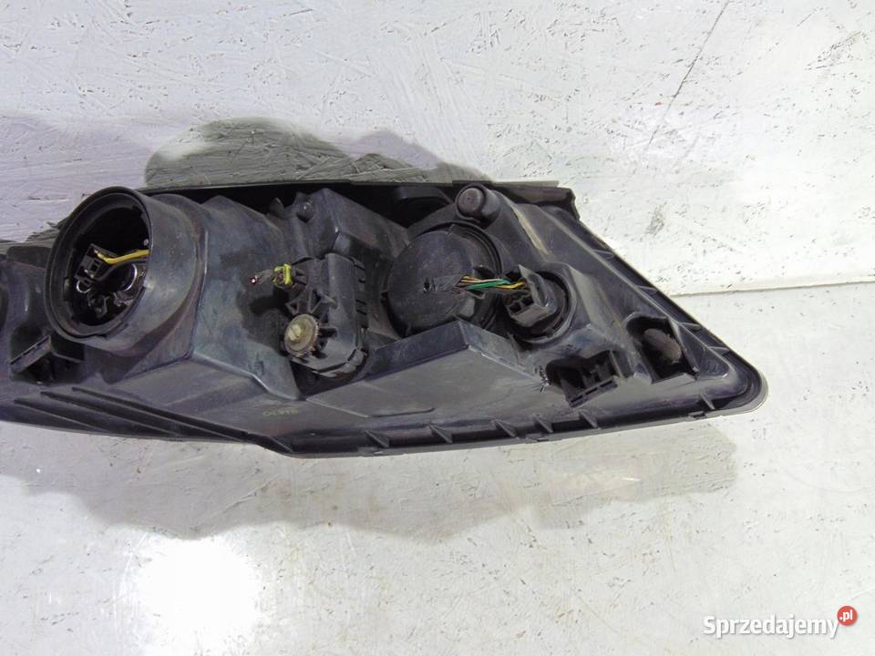 LAMPA LEWA PRZEDNIA PRZÓD ANGLIK KIA CARENS II osobowe Lampy przednie