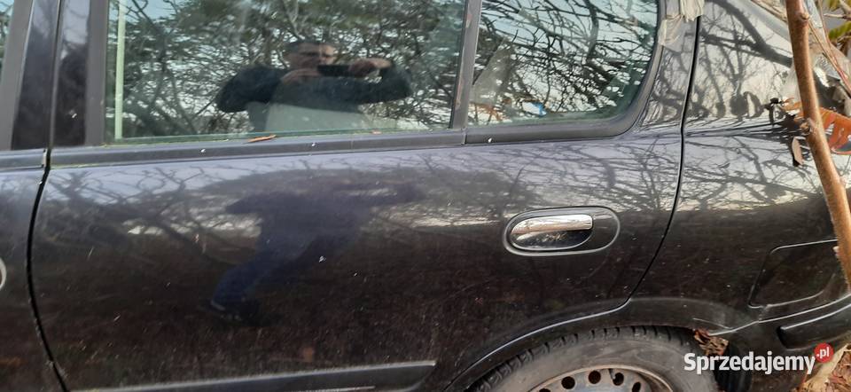 Drzwi lewe lewy tył nissan Almera n16 kolor Z11 Części samochodowe Szczecin