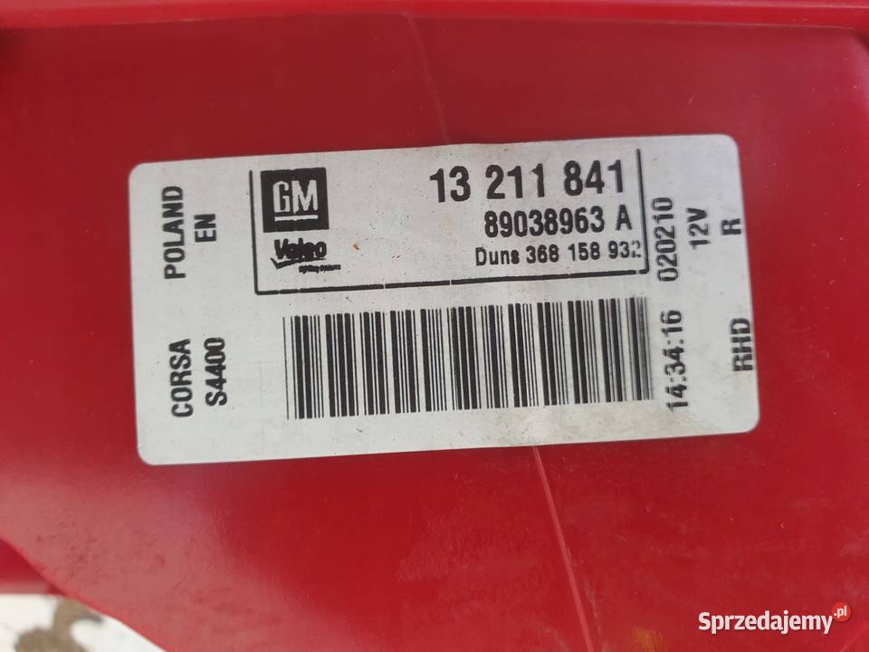 Opel Corsa D 0614r TYLNA TYLNIA LAMPA PRAWA Rudka