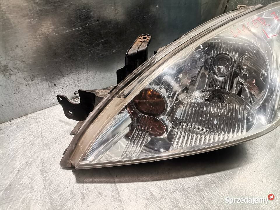 REFLEKTOR LAMPA LEWY PRZÓD MITSUBISHI LANCER 7 lewe Nowy Sącz