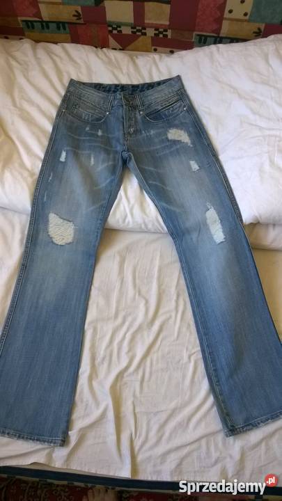 Męskie jeansy jasne z przetarciami