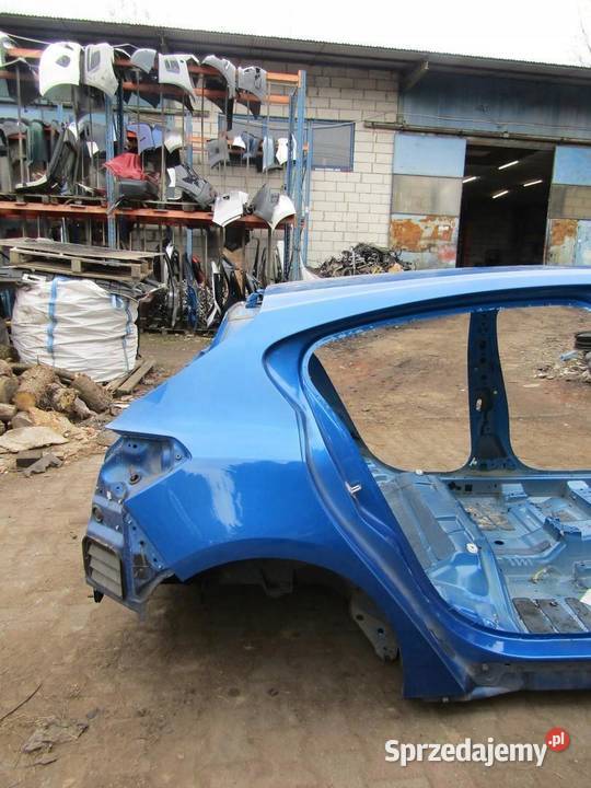 ĆWIARTKA BŁOTNIK PRAWY TYLNY TYŁ IJ FORD FOCUS