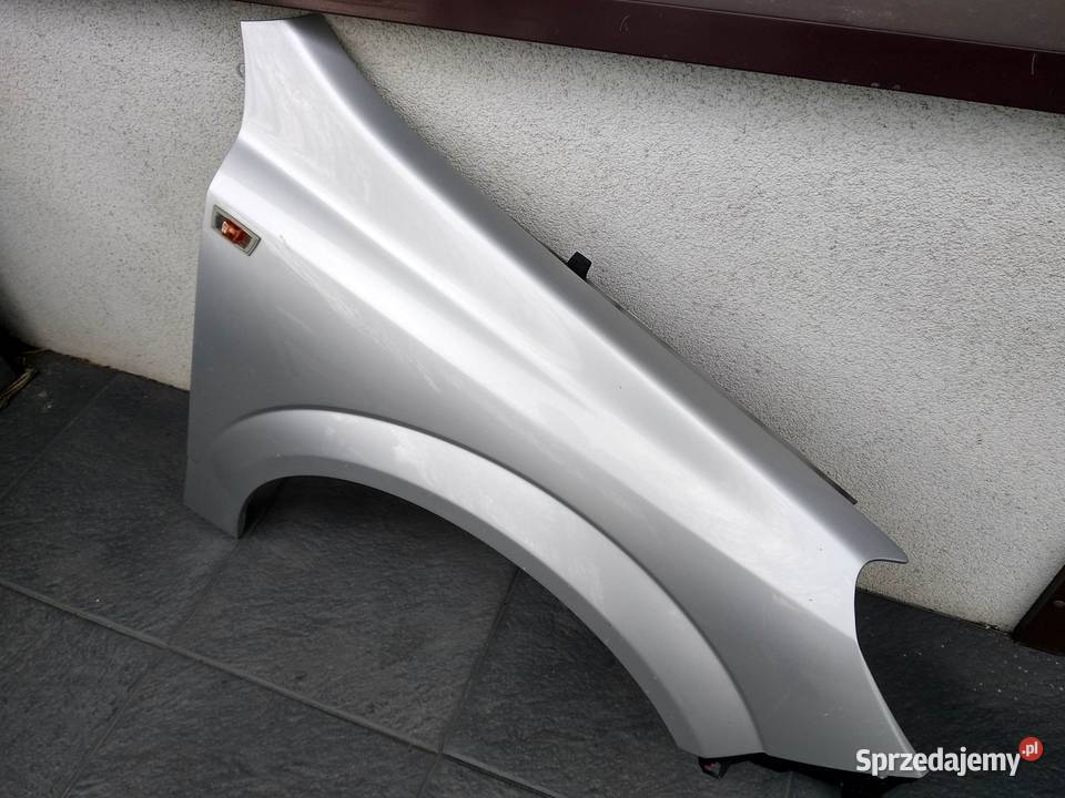 Opel Astra H błotnik przedni lewy srebrny Z157 Sieradz
