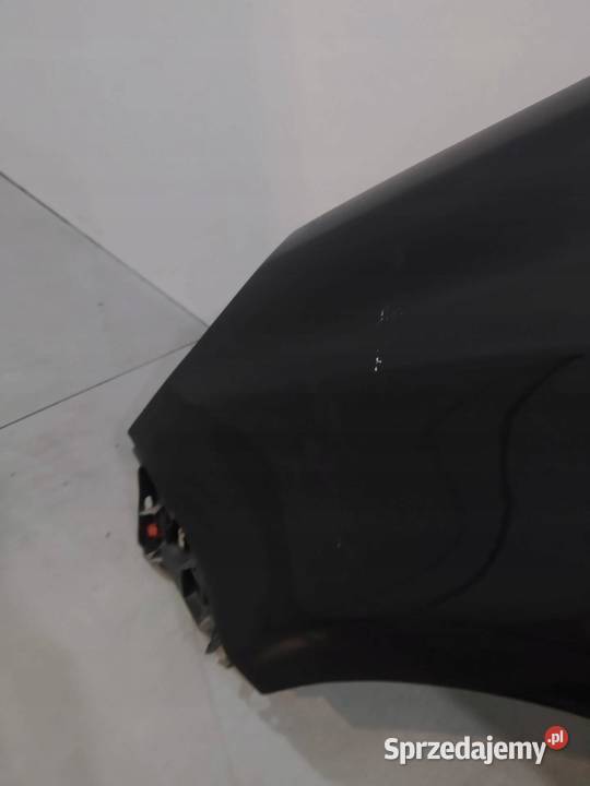 BŁOTNIK LEWY PRZÓD Z20R Opel Corsa IV 20062014 D