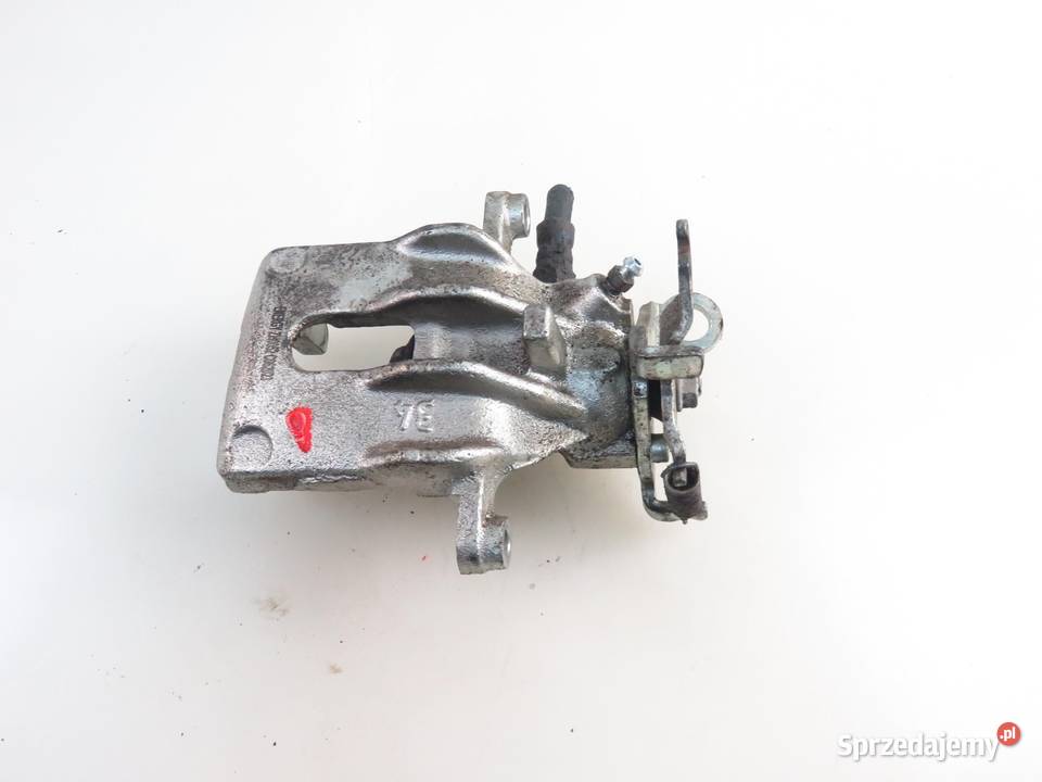 ZACISK LEWY TYŁ FORD FOCUS MK1 Turnier 18 16V Zaciski i jarzma