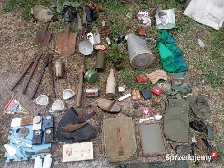 Chlebak plecak latarka nożyce łopatka ryby biwak