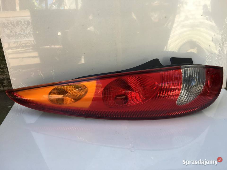 NISSAN ALMERA TINO LEWA LAMPA TYŁ Ostroróg